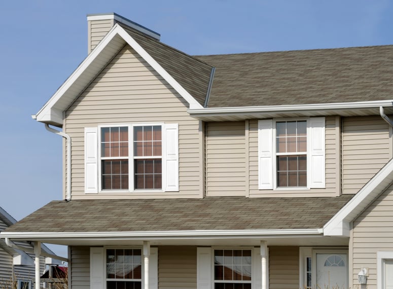 Residential Home With Vinyl Siding, Gable Roof, Seamless Gutters, Shutters